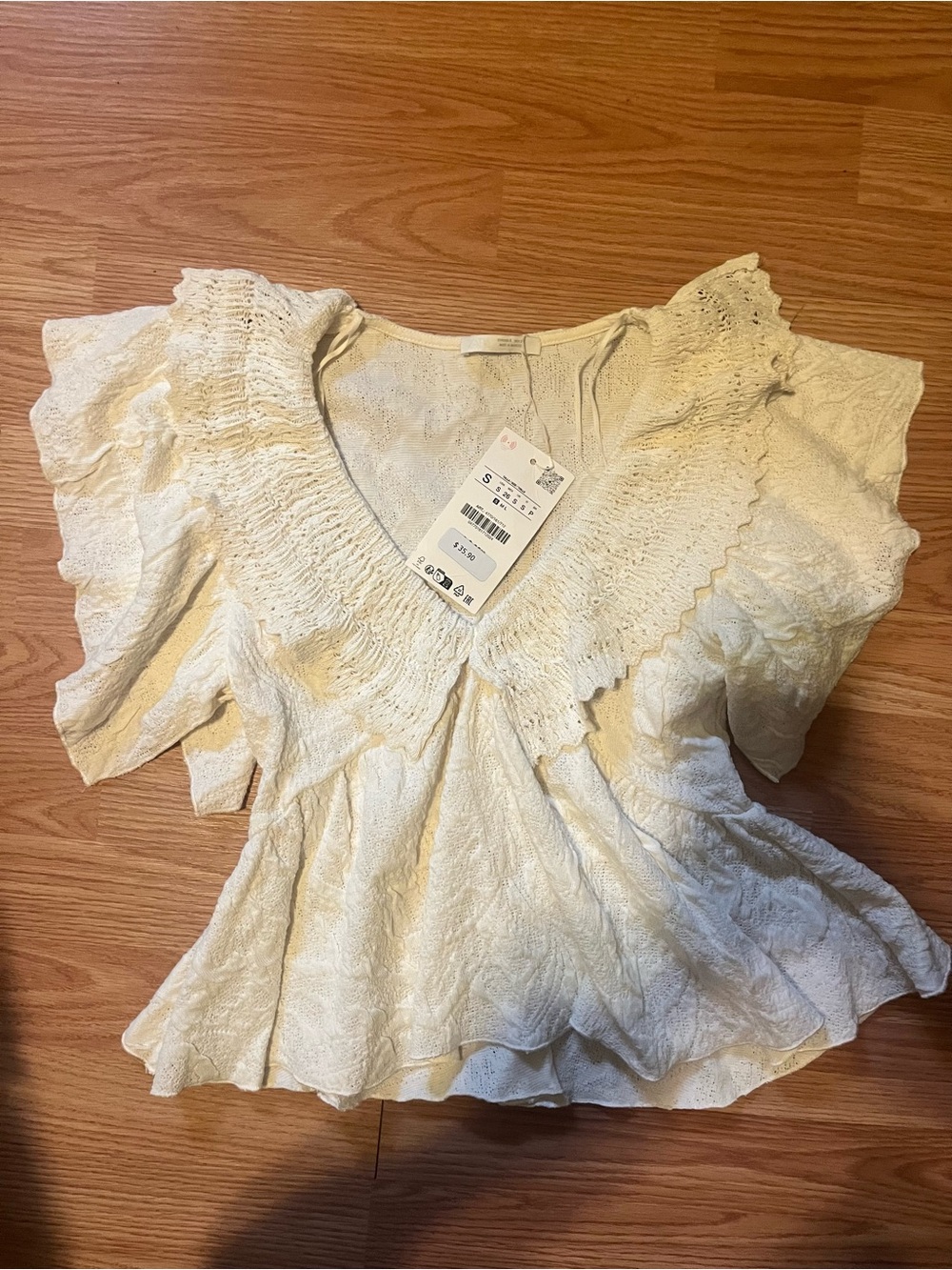Zara Women's Cream Textured Peplum Top
